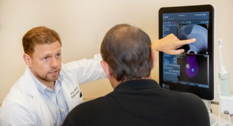 Doctor speaking with a male patient.