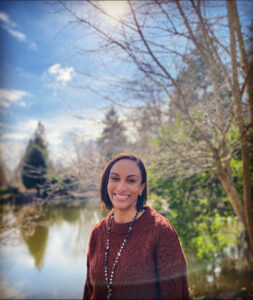 Woman standing outside on a sunny day