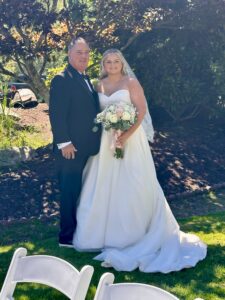 Dad and daughter in wedding attire