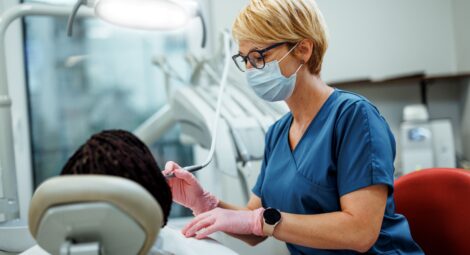 A dentist treating a patient